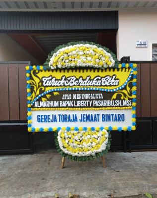 Papan Bunga Duka di Sarimekar